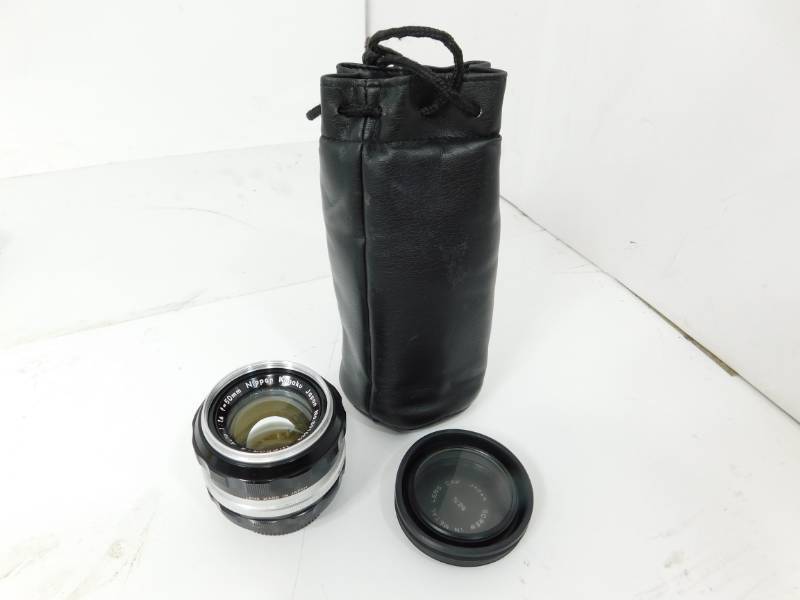 lot 20 image: Nikon  50 mm Lens--No. 891652   (In Carrying Case)