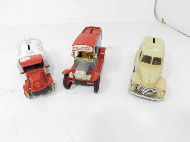 lot 38 image: Three Metal Replica Vehicles Banks