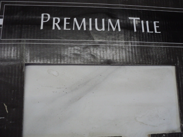 Premium tile, 16 sf per case, some ...