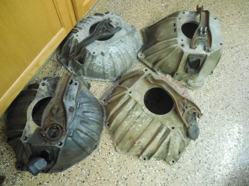 lot 18 image: GM BELL HOUSING LOT OF 4 WITH FORKS
