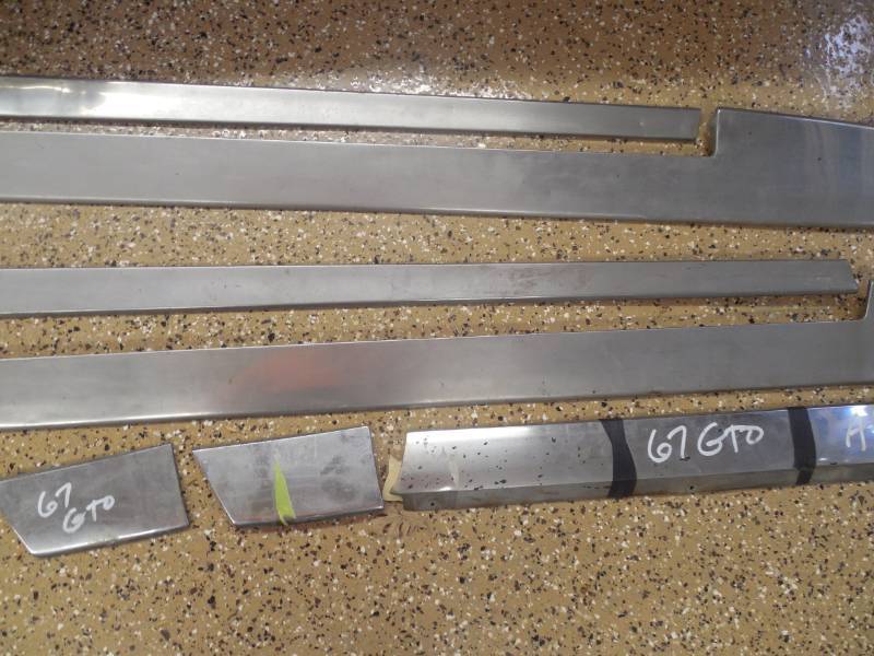 lot 20 image: 1967 GTO ROCKER CHROME SET