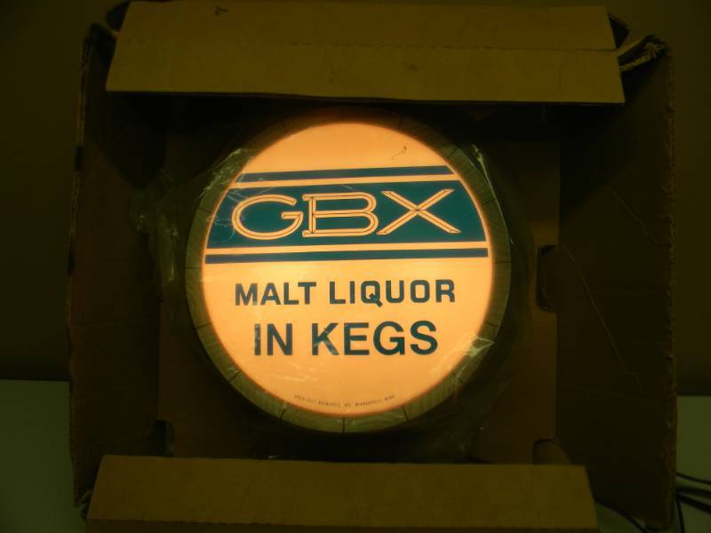 lot 21 image: VERY RARE - VINTAGE NOS (STILL IN BOX) GBX MALT LIQUOR IN KEGS LIGHT, GRAIN BELT BREWERIES INC. MPLS. MN. - APPROX 16 ROUND - SEE PICTURES