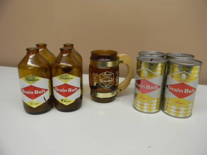lot 34 image: VINTAGE GRAIN BELT BEER - 1 Siesta Glass Mug Stanley & Albert Advertising - 4 OLD BOTTLES - 4 CAN BANKS - SEE PICTURES