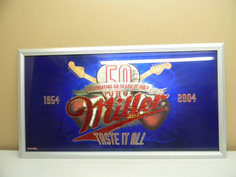 lot 68 image: MILLER 50 YEARS OF ROCK - 1954-2004 TASTE IT ALL - BAR SIGNMIRROR - AWESOME PIECE - APPROX 40 BY 22 - SEE PICTURES