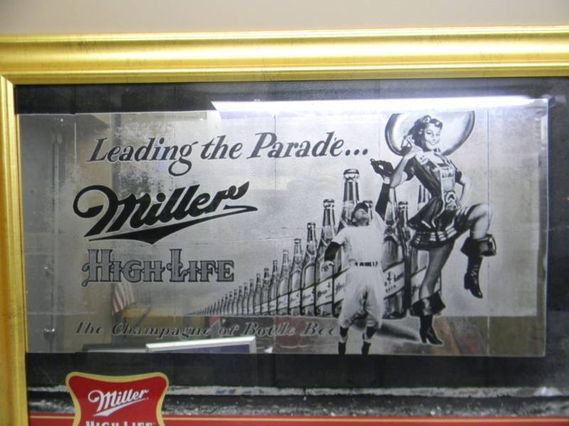 lot 69 image: VINTAGE AWESOME MILLER HIGH LIFE (LEADING THE PARADE THE CHAMPAGNE OF BOTTLE BEER) BAR SIGN  MIRROR - APPROX 36 BY 26 - AWESOME - SEE PICTURES