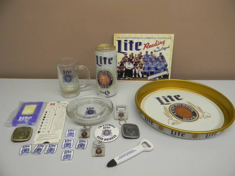 lot 72 image: VINTAGE NOS MILLER LITE BEER COLLECTION - SEE PICTURES