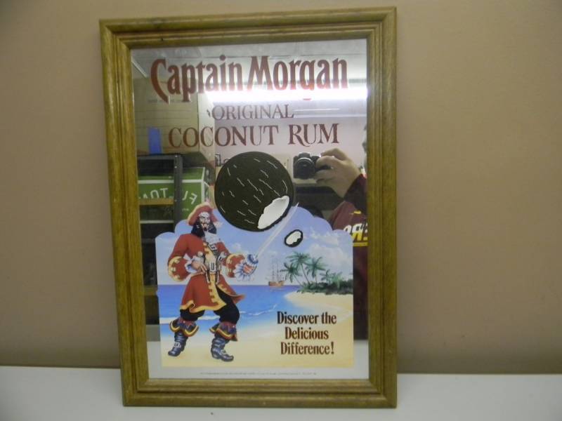 lot 81 image: VINTAGE CAPTAIN MORGAN ORIGINAL COCONUT RUM BAR SIGNMIRROR - APPROX 16 BY 22 - SEE PICTURES