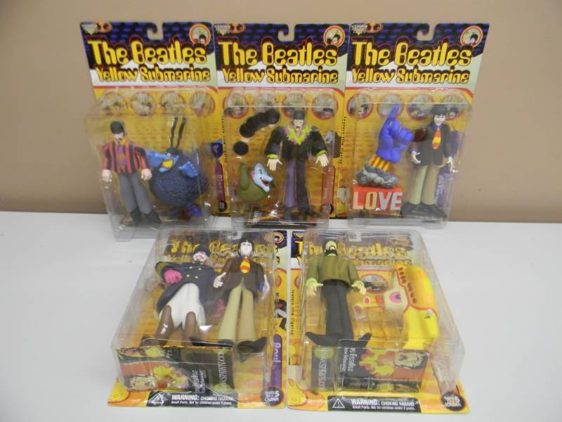lot 106 image: COLLECTION OF 5 -  Mcfarlane Toys The Beatles Yellow Submarine Action Figures  - 1999 STILL IN PACKAGE - SEE PICTURES