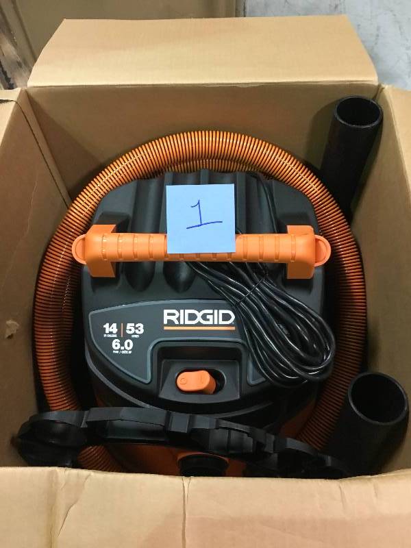 lot 1 image: Ridgid 14 Gal. 6.0-Peak HP Wet Dry Vac with Auto Detail Kit in good condition