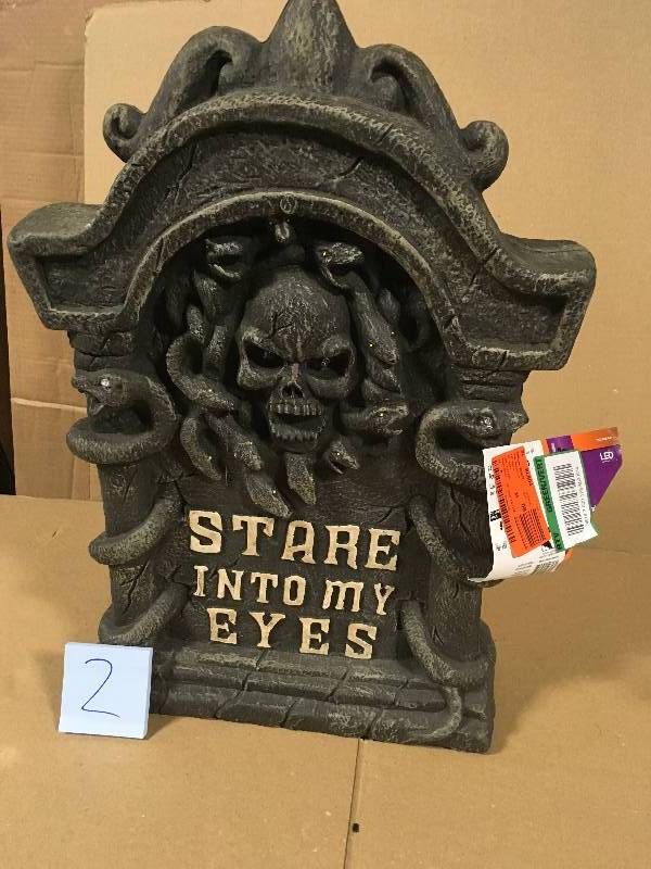 lot 102 image: Home Accents Holiday 22 in. H Halloween Lighted Tombstone