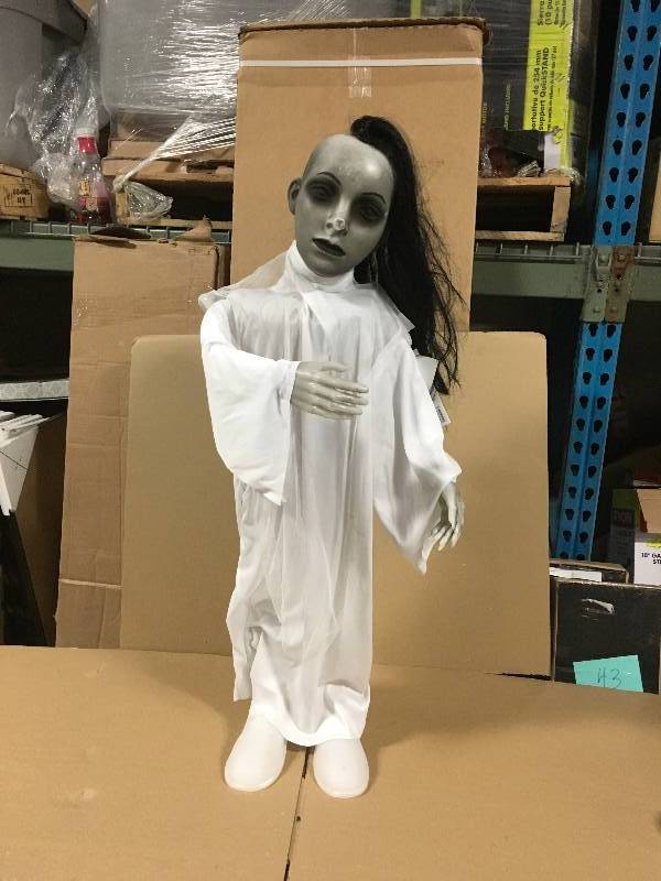 lot 103 image: Home Accents Holiday 36 in. Animated Standing Girl with Light and Sound
