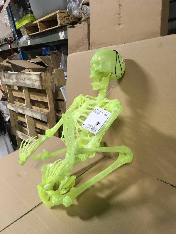 lot 104 image: Home Accents Holiday 60 in. Glow-in-the-Dark Poseable Skeleton