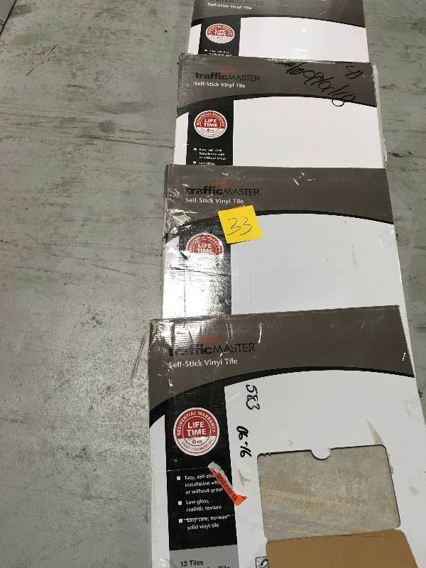 lot 33 image: LOT OF 4 CASES TrafficMASTER Light Grey 18 in. x 18 in. Slate Peel and Stick Vinyl Tile Flooring (27 sq. ft.  case), Light Grey SlateSandstone Emboss
