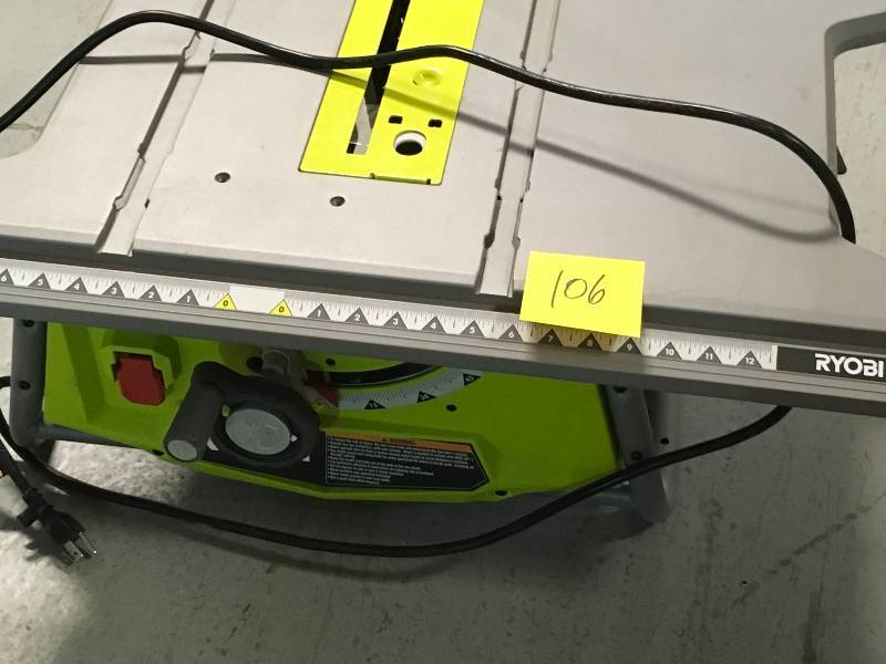lot 106 image: Ryobi 10 in. Table Saw with Folding Stand used in working condition