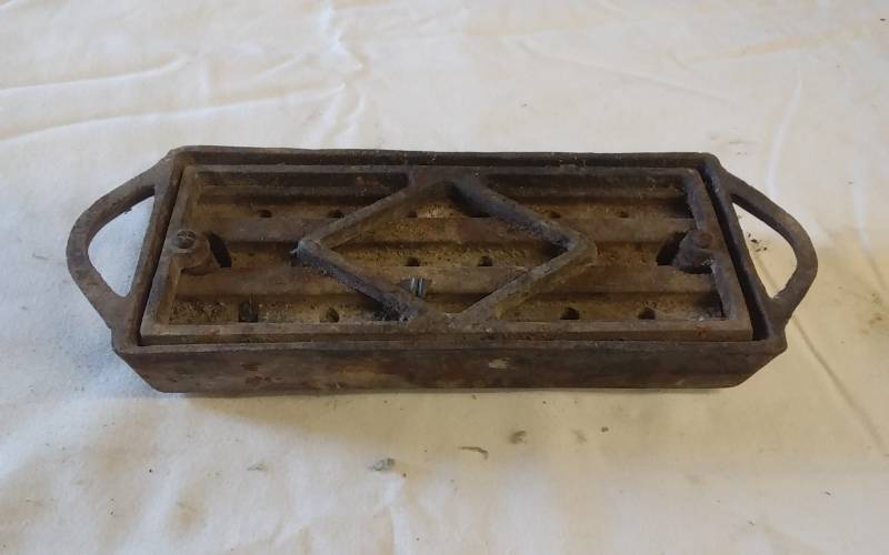 lot 15 image: Vintage Cast Iron Fire Starter