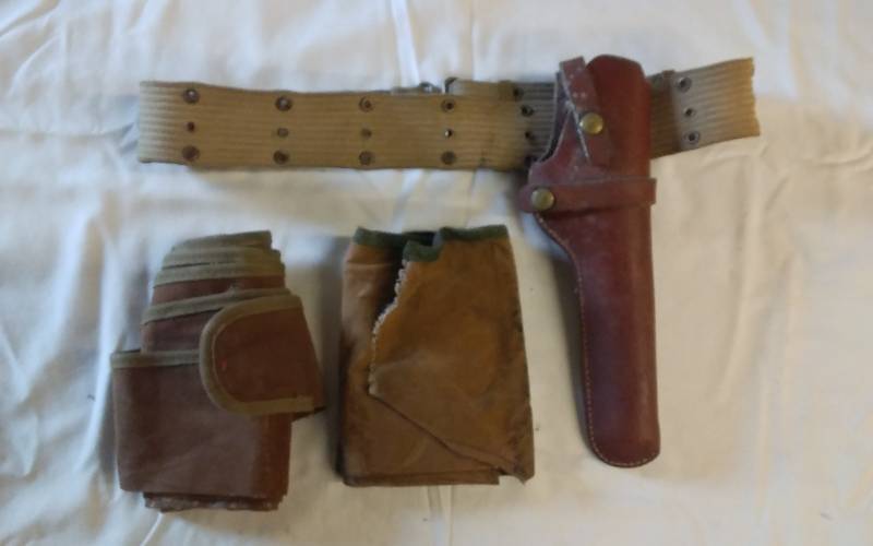 lot 35 image: 2-Gun Socks, 1-Leather Holster On Belt