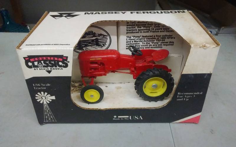 lot 94 image: Massey-Harris Pony With Original Box (Ertl, Dyersville, Iowa)