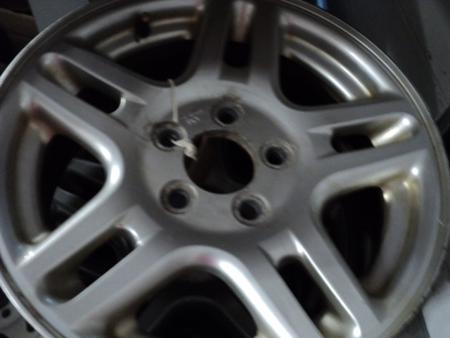 lot 11 image: 4 16 Ford Rims - 4 12 bolt patte...