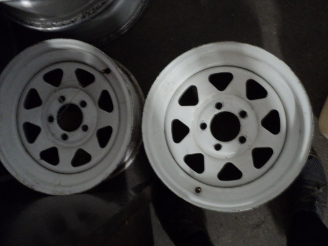 lot 12 image: 2 15 trailer rims - 4 12 bolt pa...