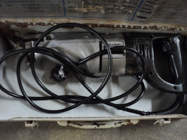 lot 32 image: Black and Decker professional saw...
