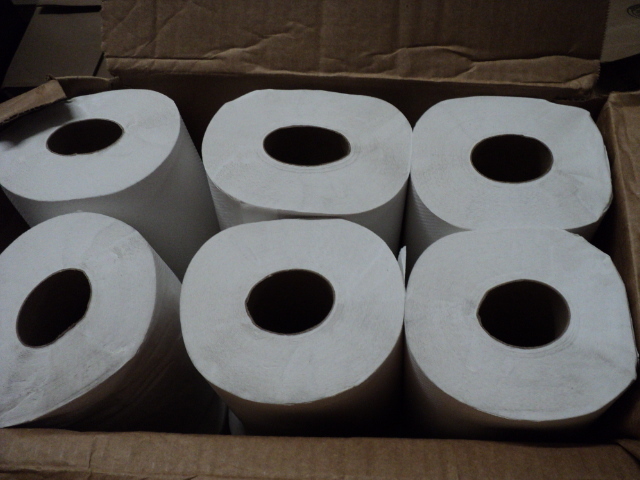 lot 91 image: 12 rolls white hand towels - box is...