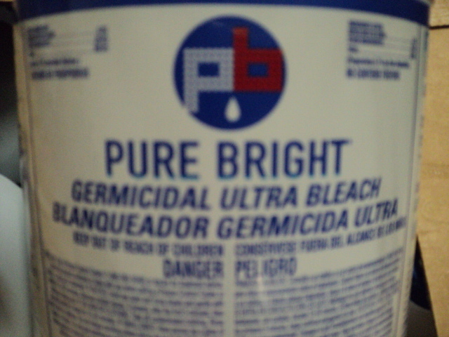 lot 107 image: 6 1 gallon bottles of Pure Bright U...