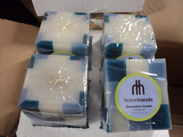 lot 176 image: case of 24 Hometrends 3x2.75 cand...