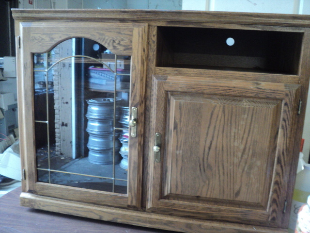 lot 203 image: wood TV stand 44x34x20...
