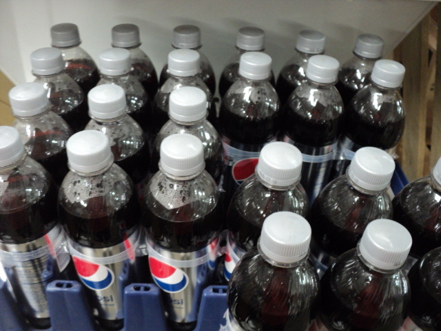 lot 246 image: 24 pack Diet Pepsi 16.9 oz. bottles...