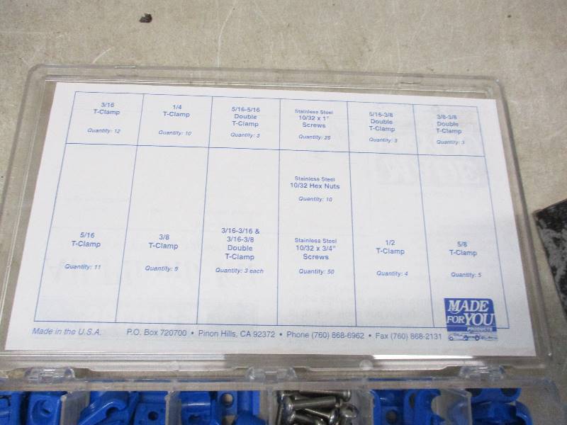 lot 21 image: Wire Loom clamps and auto parts