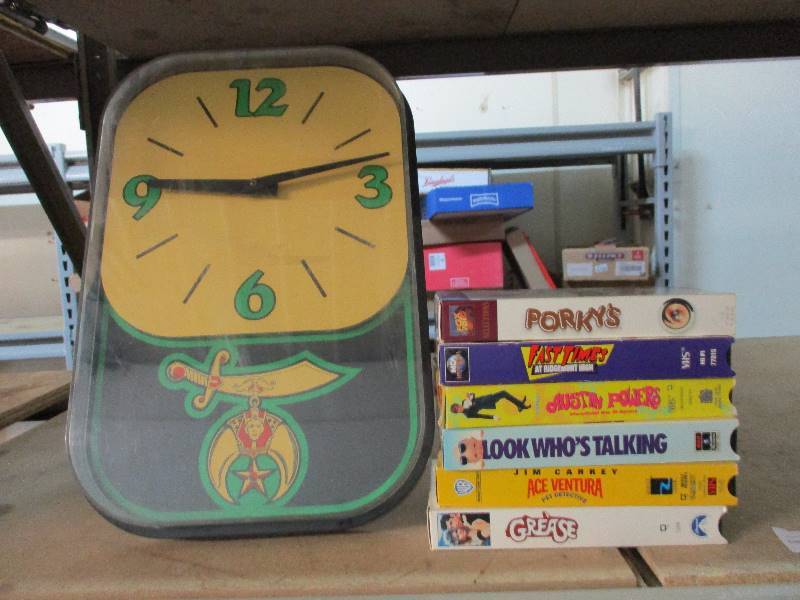 lot 61 image: Clock and comedy movies