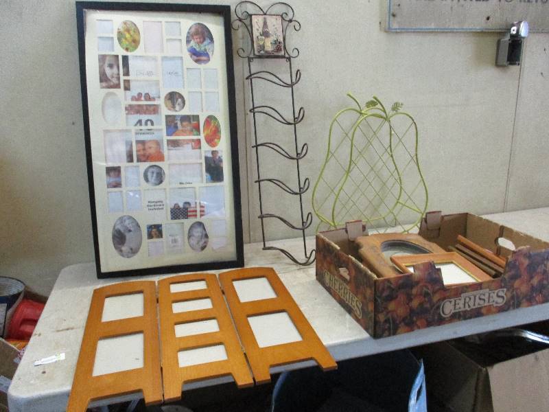 lot 66 image: Picture frames and wine racks