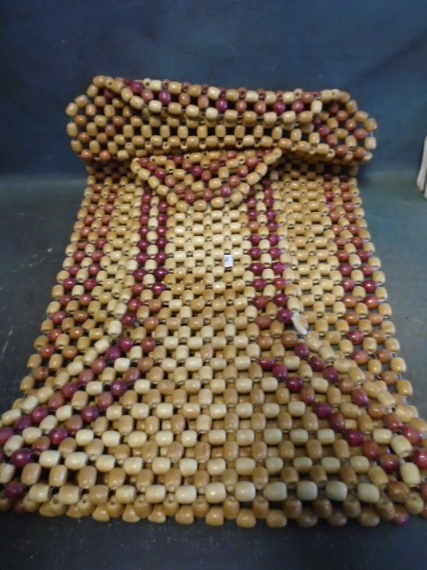 lot 90 image: Wooden Bead Seat or Chair Cover