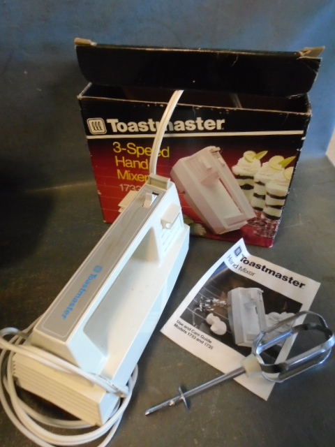lot 99 image: Vintage Hand Mixer, Metal Ice Cube Tray and More