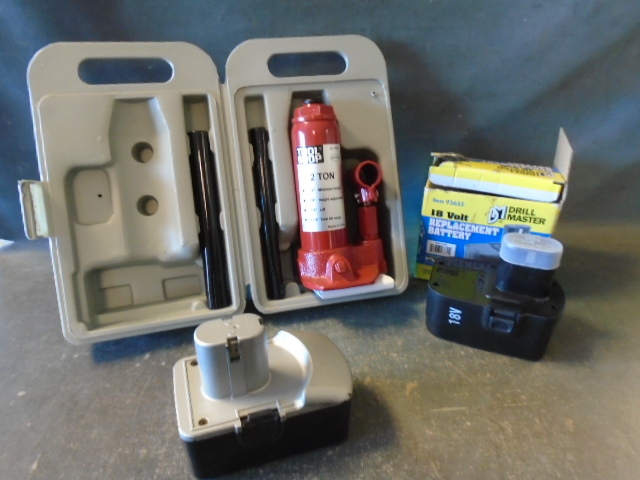 lot 116 image: 2 Ton Jack and Replacement Batteries