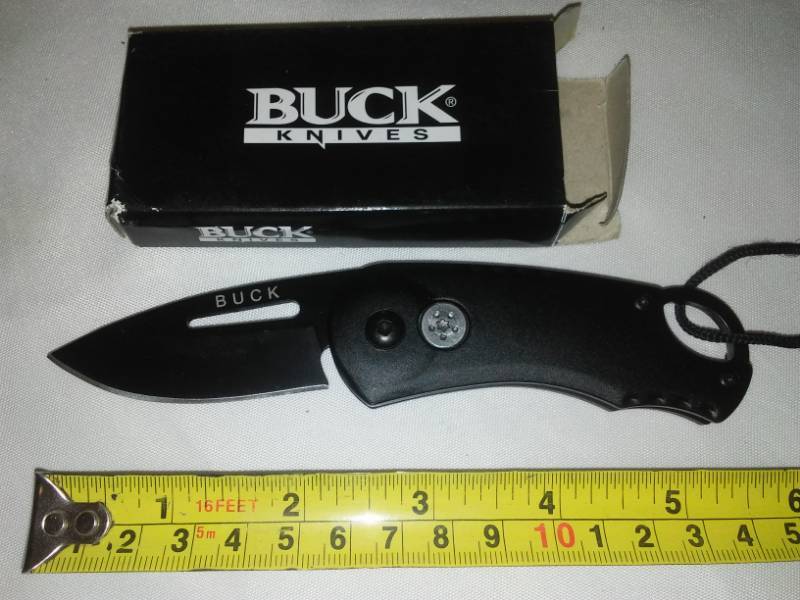 lot 24 image: Buck knife foldable pocket knife.