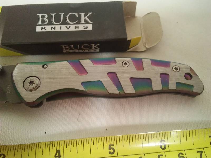 lot 32 image: Buck knife foldable pocket knife with inlaid.