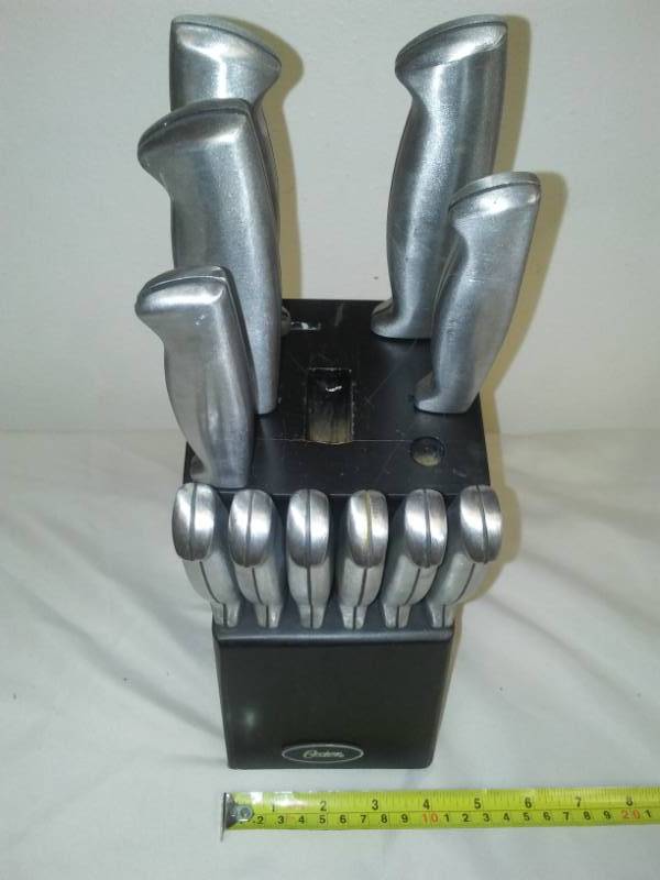 lot 37 image: Oster knife set and block - excellent.
