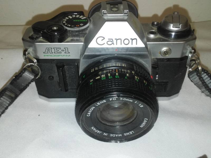 lot 43 image: Canon AE - 1 program 35 mm  lens.