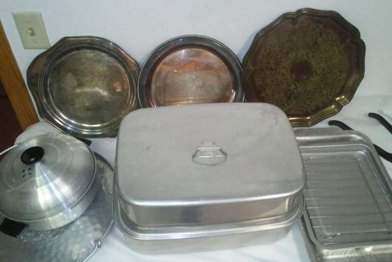 lot 58 image: Roaster pan, silver trays, aluminum trays and more.