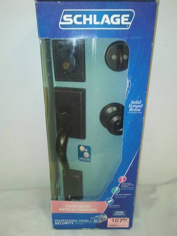 lot 75 image: Schlage fancy solid brass deadbolt front door handle lock set. New in box.