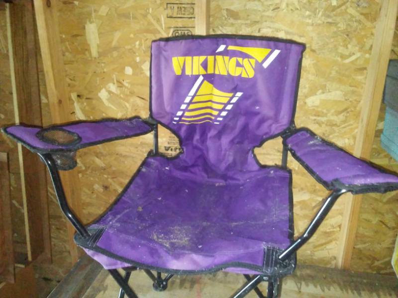 lot 132 image: Minnesota Vikings collapsible lawn chair.