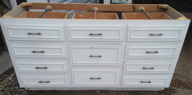 lot 137 image: Cabinet base with 11 drawers.