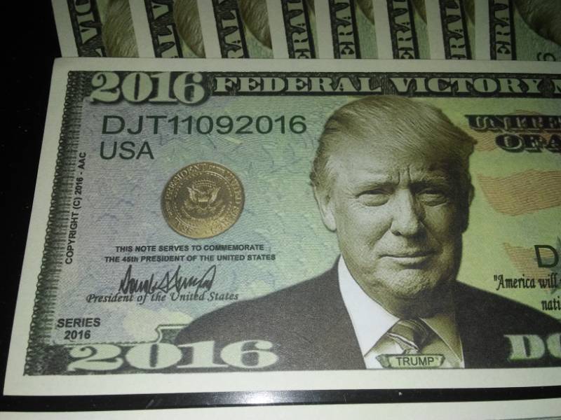 lot 142 image: 10 President Donald Trump 2016 bills. Punk your favorite Democrat.