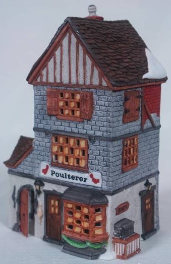 lot 32 image: Poulterer - Dickens Village