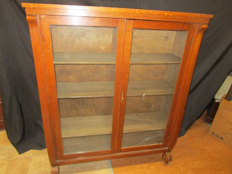 lot 24 image: Antique Glass Doored Book Case 43.75X13.5