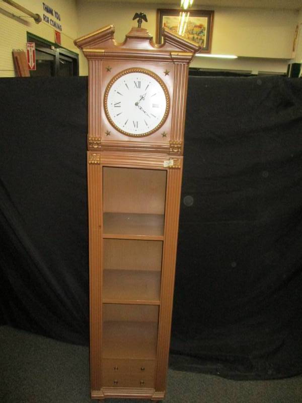 lot 60 image: Unique Clock with plastic front that looks like wood