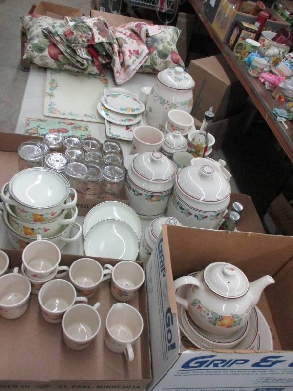 lot 76 image: 85 plus Corelle Fruit set, tons of pieces including linenes and all the extras