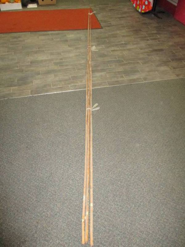 lot 79 image: 3 long bamboo fishing poles