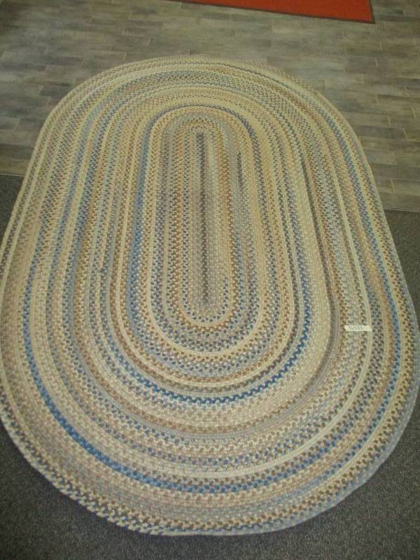 lot 81 image: Large Braided Rug